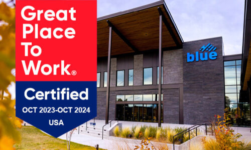 Great Place to Work Certified Oct 2023 - Oct 2024 tag placed over an image of Blue Federal Credit Union's Headquarters.